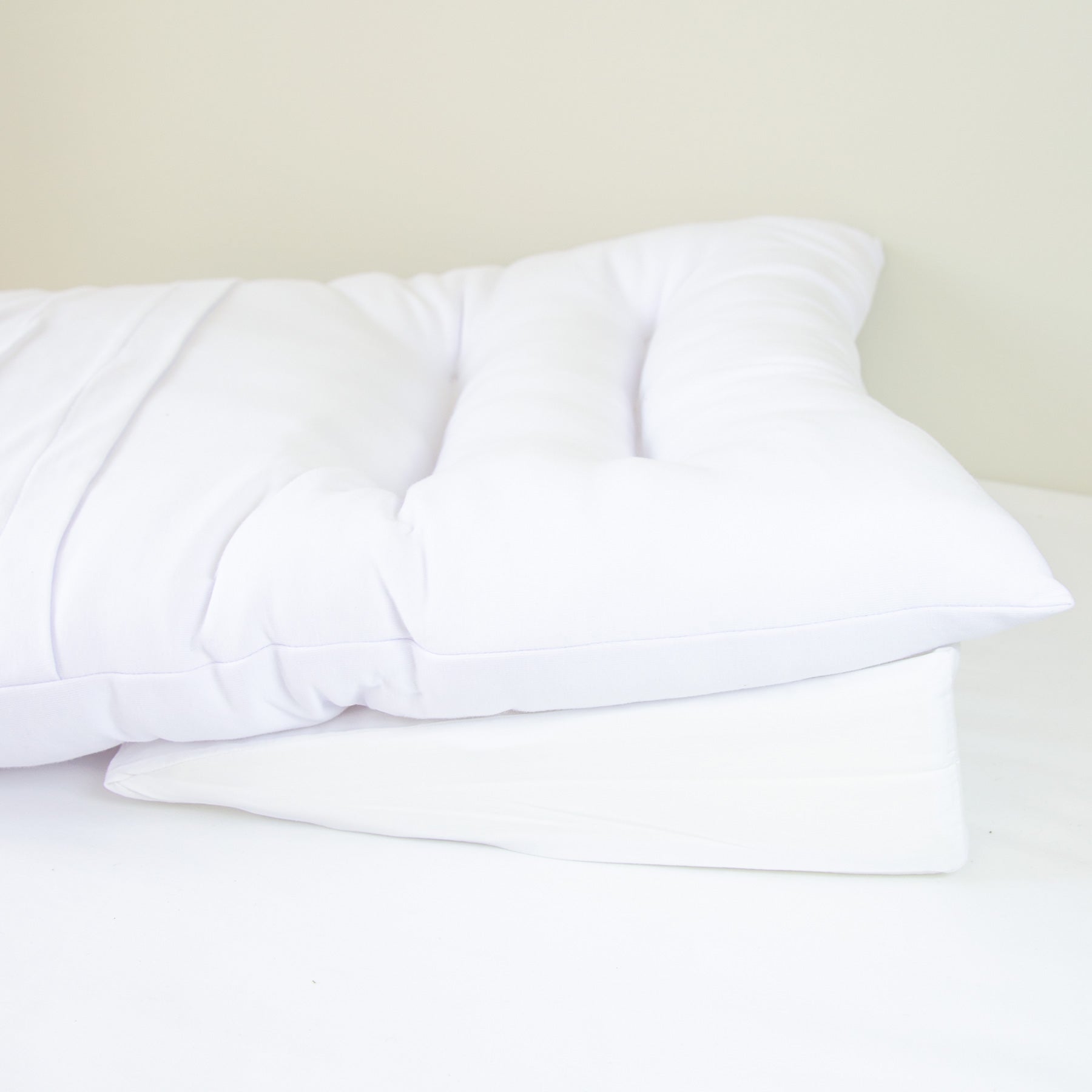 How can the nurtureOne nesting cushion help with reflux?